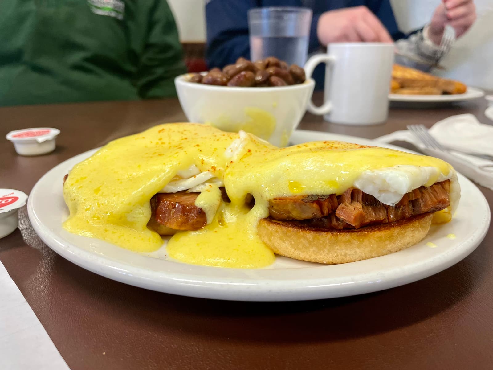 Runny yolks, generous hollandaise, and molasses baked beans come together in a hearty, no-frills take on a classic