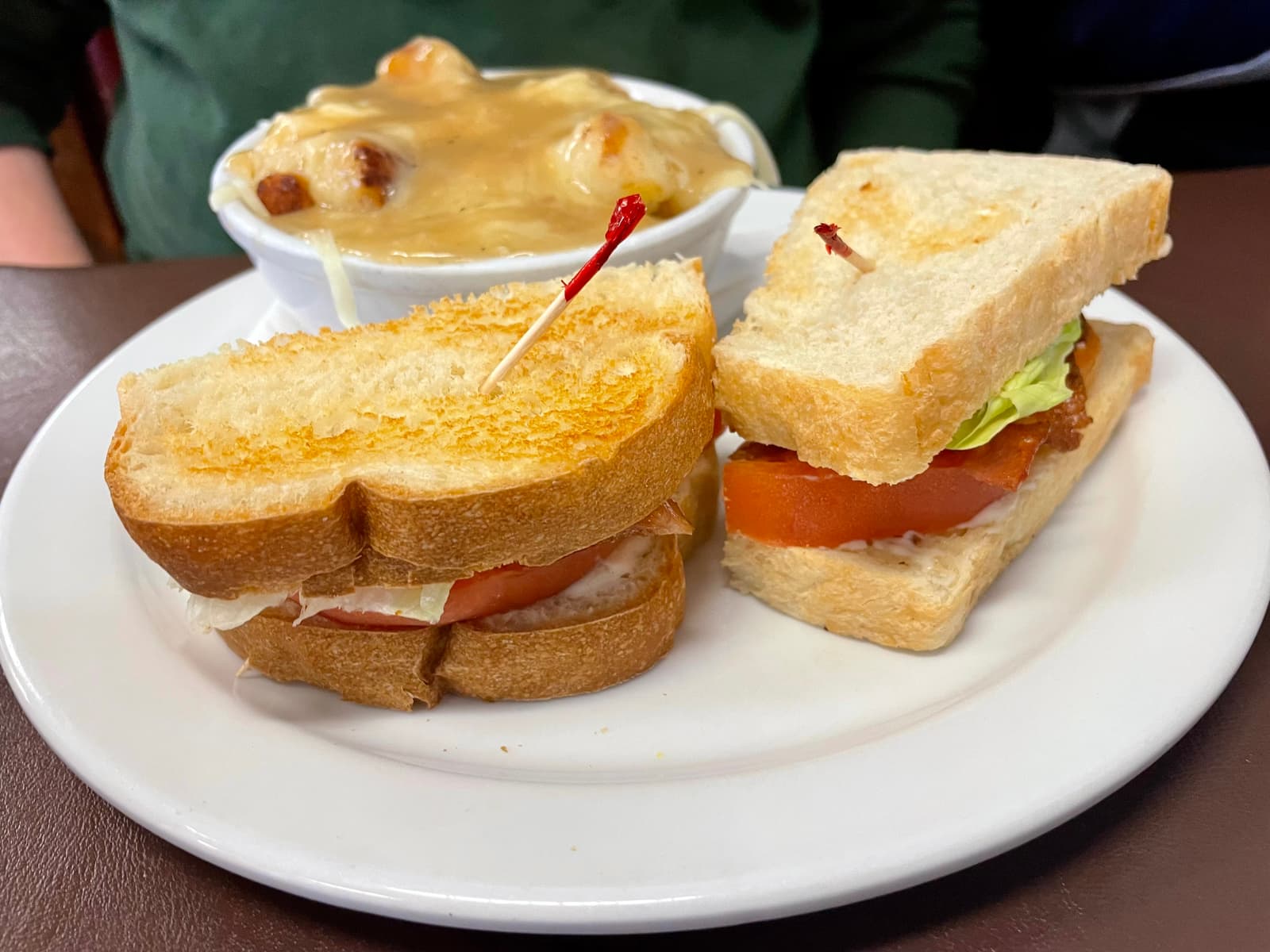 Fresh, homemade bread layered with crisp bacon and simple fillings that lean fully into comfort and nostalgia