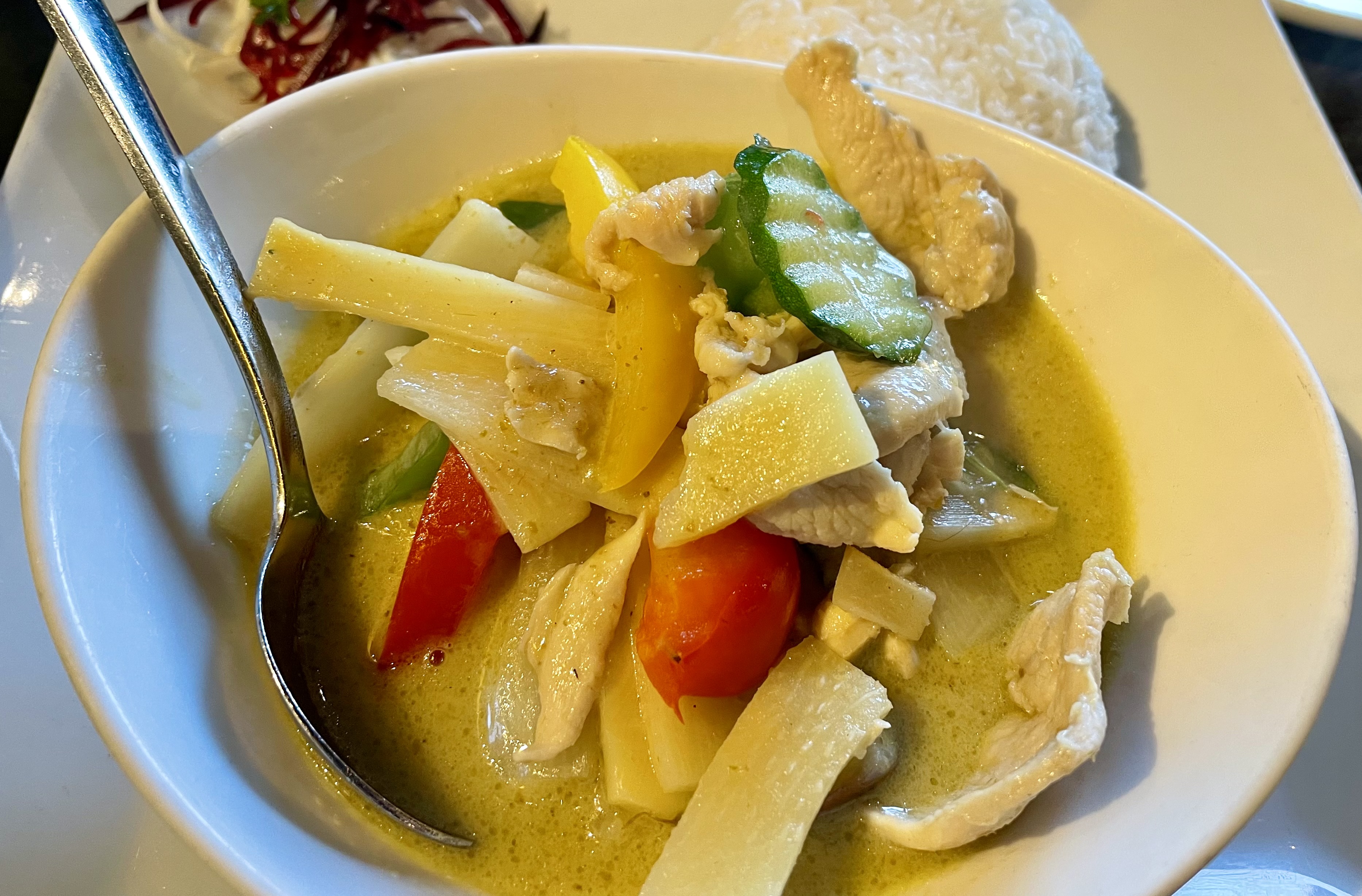 We ordered the green curry with chicken, eggplant, bamboo slices, basil leaves and bell pepper in spicy curry with coconut milk.