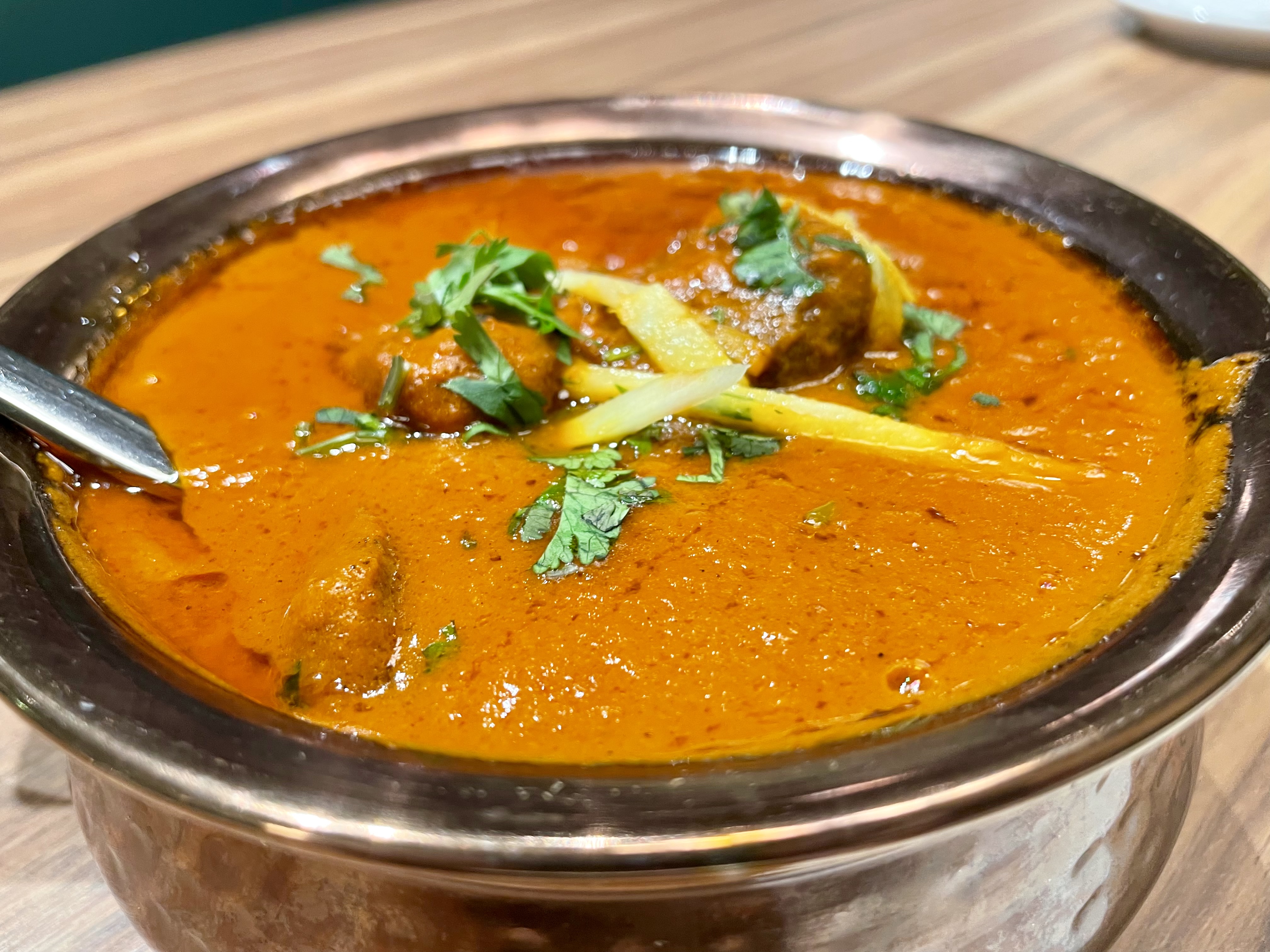 Rogan josh is a lamb curry with a heady combination of intense spices in onion tomato curry sauce
