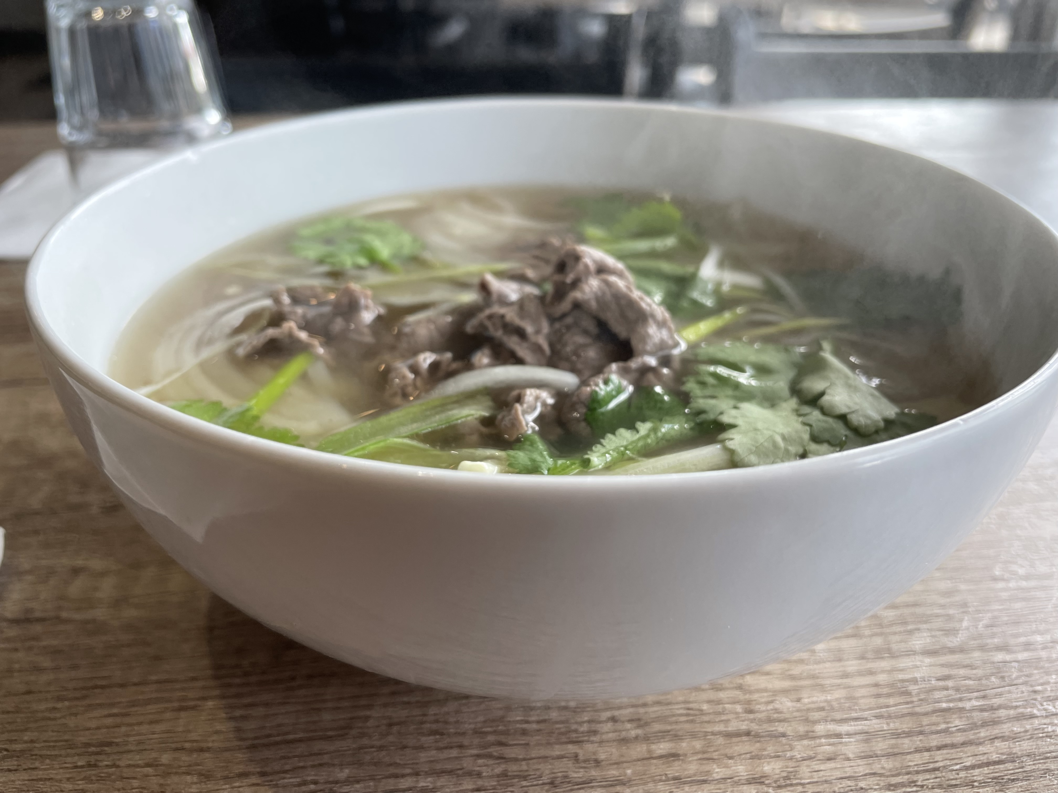 Item P5 on the menu, the well-done beef pho cost $16 for a regular size portion and $18 for a large