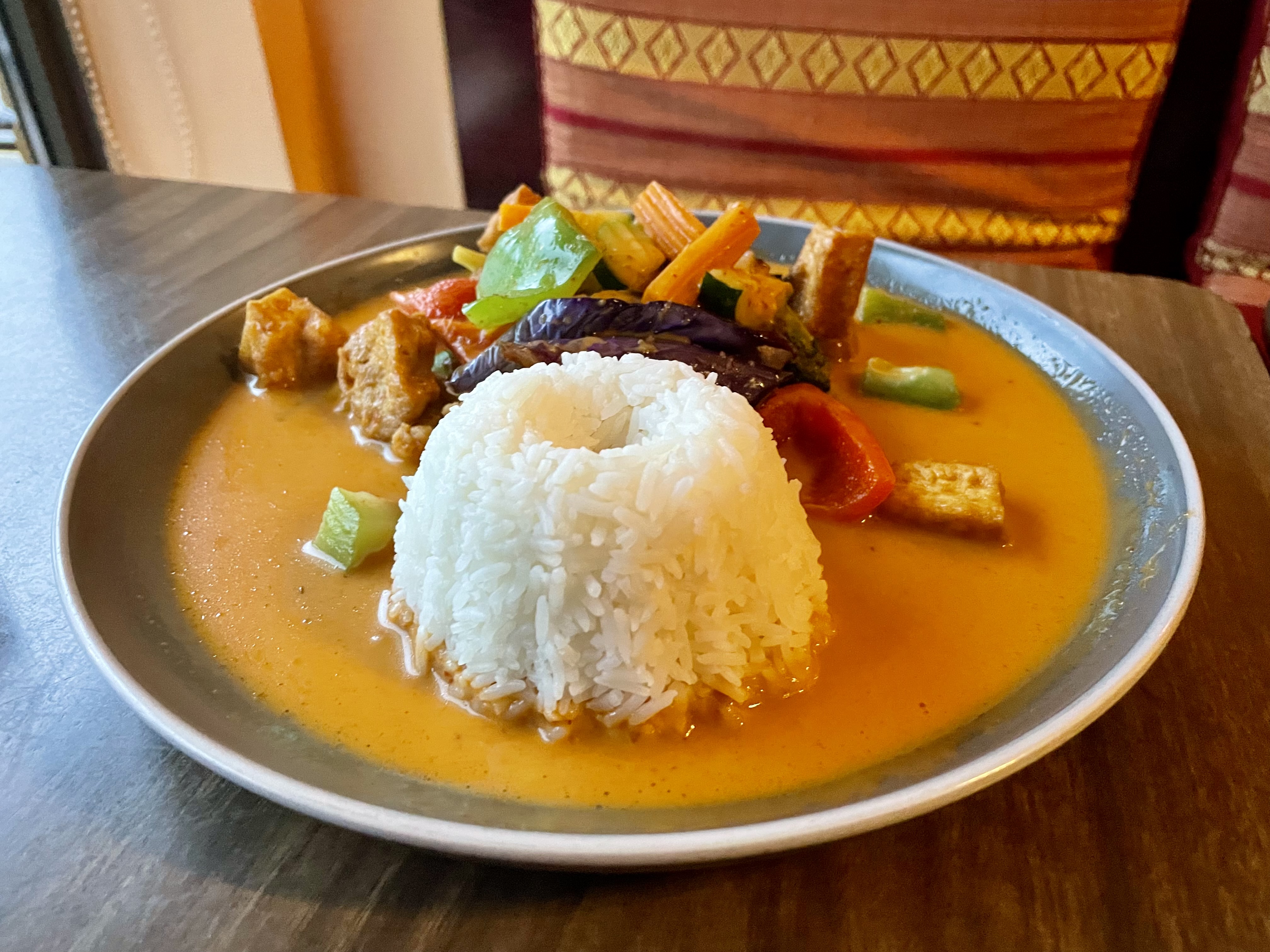 Our friend Taylor's tofu red curry was served with eggplant, chayote squash, zucchini, green and red peppers, cooked in a curry sauce