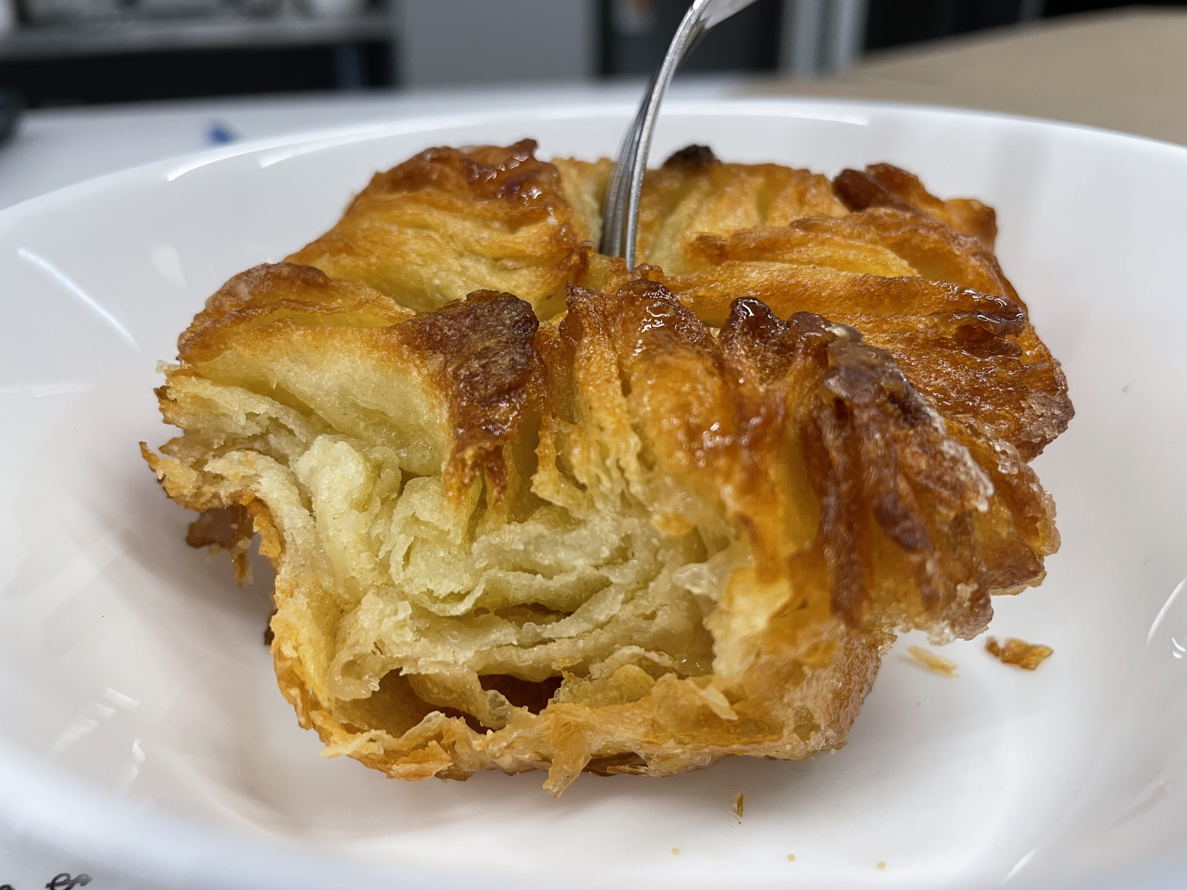 An iconic dough pastry from northwestern France, kouign-amann takes its name from the Breton words for bread and butter