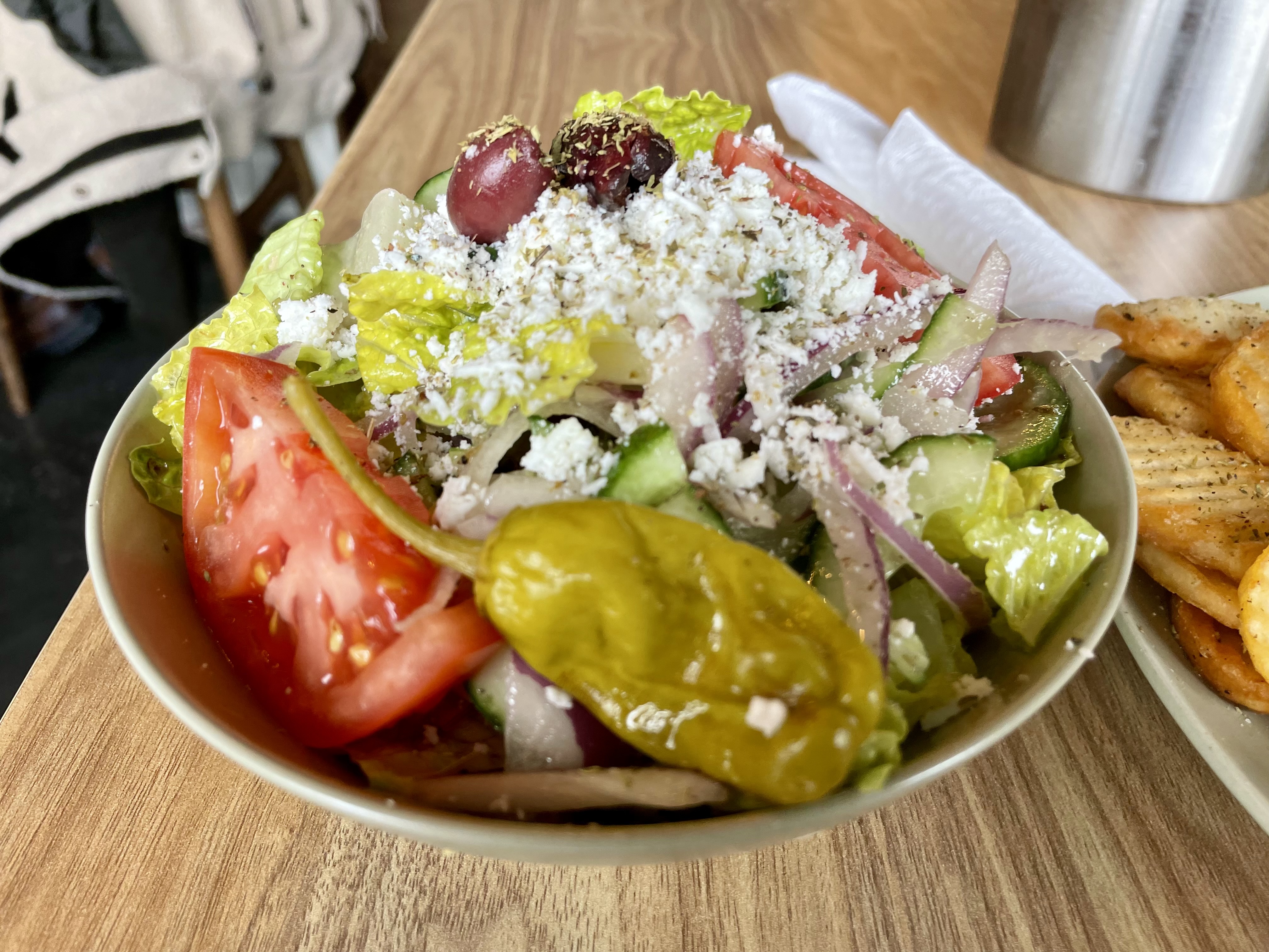 A fresh and vibrant Greek salad, with crisp cucumbers, tangy feta, and a burst of olive oil and lemon—simple, but unforgettable