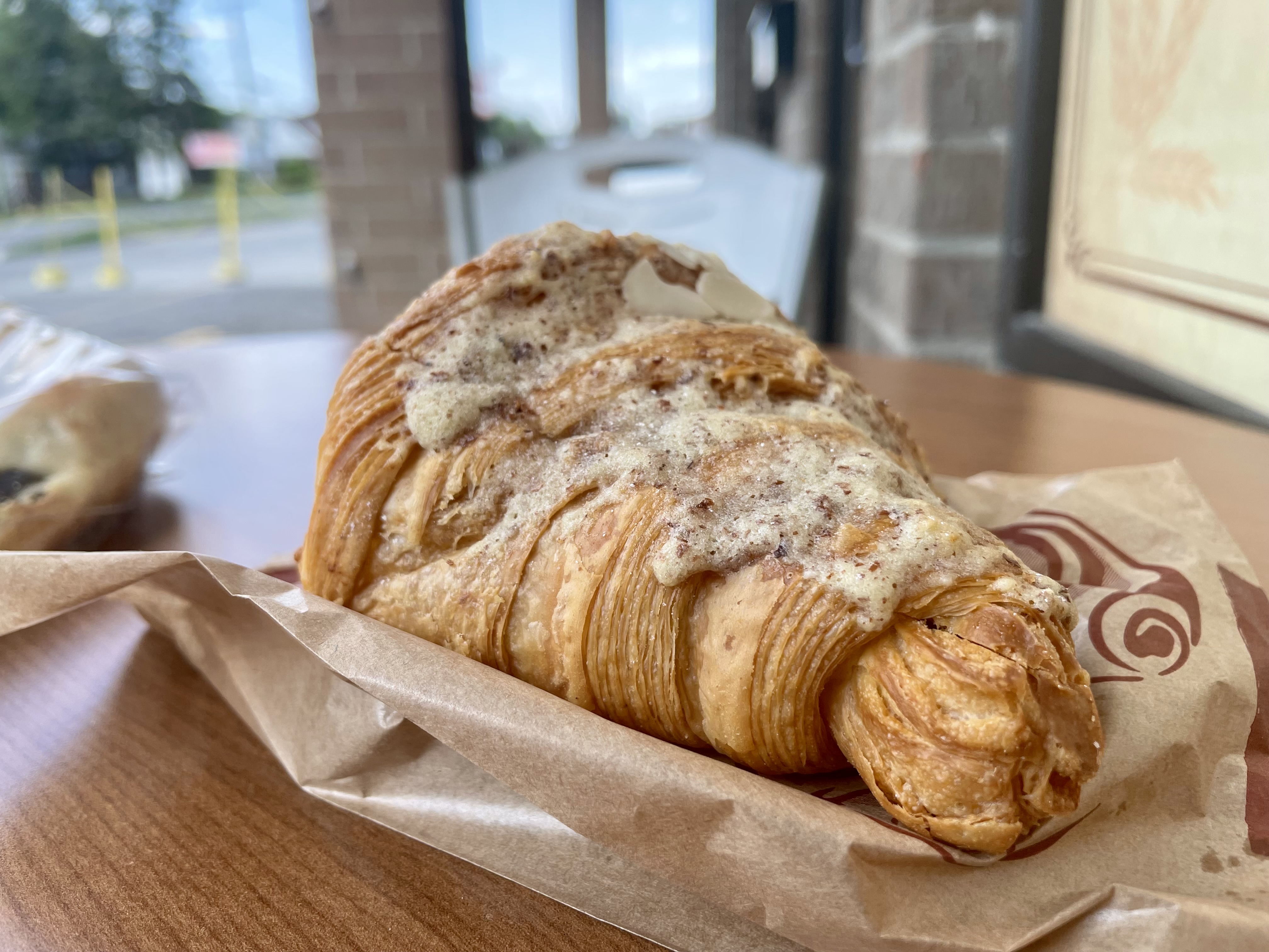 Flaky, fragrant, and quietly complex—this almond croissant hides a cinnamon-sweet centre beneath its golden crust, and tastes like it was made just for you