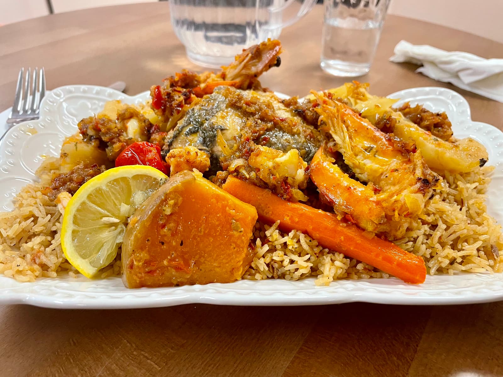 Thieboudienne — fish, shrimp, vegetables, and spice woven into a dish that tastes like West Africa on a plate