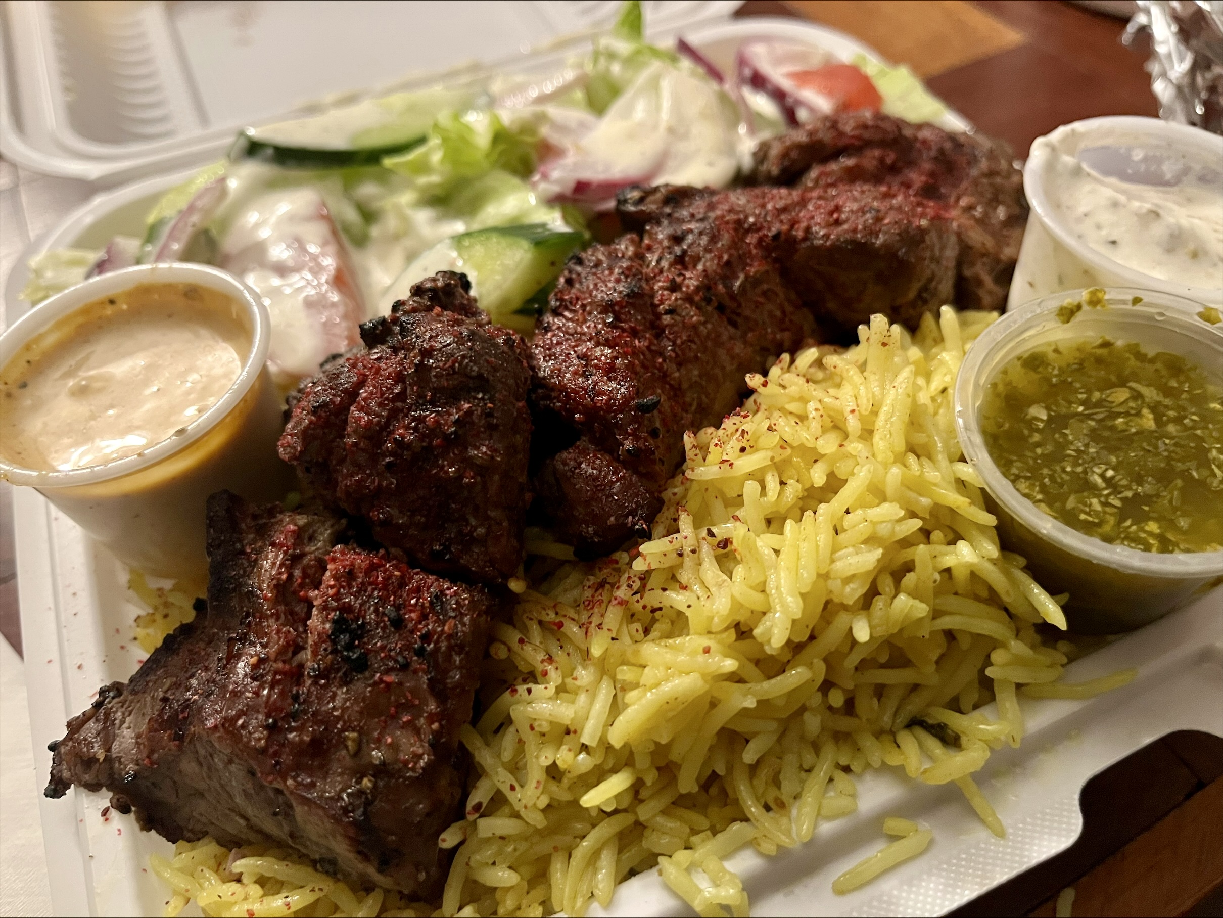 Tender beef tikka, fragrant rice, and three sauces that tie it all together